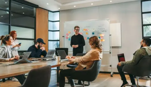 Group planning website design with vision board